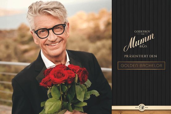 Der "Golden Bachelor" mit einem Strauß Rosen und dem Logo Godefroy von Mumm